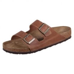 Klapki unisex Birkenstock Arizona Cognac. Brązowe klapki męskie Birkenstock, bez wzorów, z materiału, bez zapięcia. Za 569.45 zł.