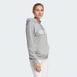 Bluza z kapturem Essentials Linear. Białe bluzy damskie Adidas, s, bez wzorów, klasyczne, bez ramiączek, z kapturem. Za 199.00 zł.