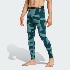 Legginsy bazowe Multi Synthetic Base Layer. Niebieskie legginsy damskie Adidas, bez wzorów. W wyprzedaży za 142.35 zł.