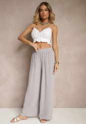 Szare Spodnie z Bawełną o Szerokim Kroju High Waist Ozdobione Guzikami Morritia. Szare spodnie materiałowe damskie Renee, bez wzorów, z bawełny, eleganckie, z podwyższonym stanem. Za 39.99 zł.