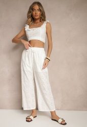 Białe Spodnie High Waist z Bawełnianej Tkaniny Zdobionej Haftem Mevirona. Białe spodnie materiałowe damskie Renee, z aplikacjami, z bawełny, eleganckie, z podwyższonym stanem. Za 49.99 zł.