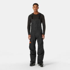 Spodnie narciarskie z szelkami Helly Hansen Elevation Infin Shell. Czarne spodnie sportowe męskie Helly Hansen, m, bez wzorów, narciarskie. W wyprzedaży za 2,573.50 zł.