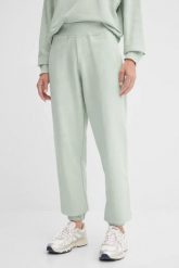 GUESS Zielone spodnie dresowe damskie Primula, Rozmiar S. Zielone spodnie dresowe damskie Guess, z aplikacjami, z dresówki. W wyprzedaży za 251.99 zł.