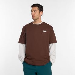 Koszulka męska New Balance Numeric MT53706ABJ– brązowa. Brązowe koszulki sportowe męskie New Balance, m, bez wzorów, z bawełny, bez ramiączek. Za 129.99 zł.