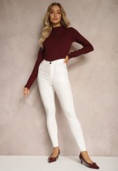 Białe Skinny Jeansy z Bawełną High Waist Lorie. Białe jeansy damskie Renee, bez wzorów, z bawełny, eleganckie, z podwyższonym stanem. Za 44.99 zł.