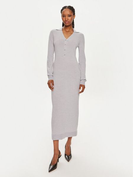 Calvin Klein Sukienka dzianinowa K20K207219 Szary Slim Fit. Szare sukienki damskie Calvin Klein, xxs, bez wzorów, z dzianiny, bez kołnierzyka, bez ramiączek. Za 609.99 zł.