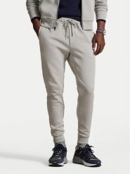 Polo Ralph Lauren Spodnie dresowe 710881518077 Szary jasny Regular Fit. Szare spodnie sportowe męskie Polo Ralph Lauren, l, bez wzorów, z bawełny. Za 692.99 zł.