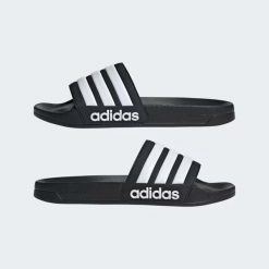 Klapki adidas Adilette Shower Slider. Białe klapki damskie Adidas, bez wzorów, sportowe, bez obcasa, bez zapięcia. Za 111.00 zł.