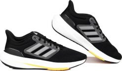 Adidas Buty męskie do biegania adidas Ultrabounce czarno-szare HP5777 47 1/3. Czarne buty sportowe męskie Adidas, bez wzorów, bez zapięcia, do biegania. Za 352.81 zł.
